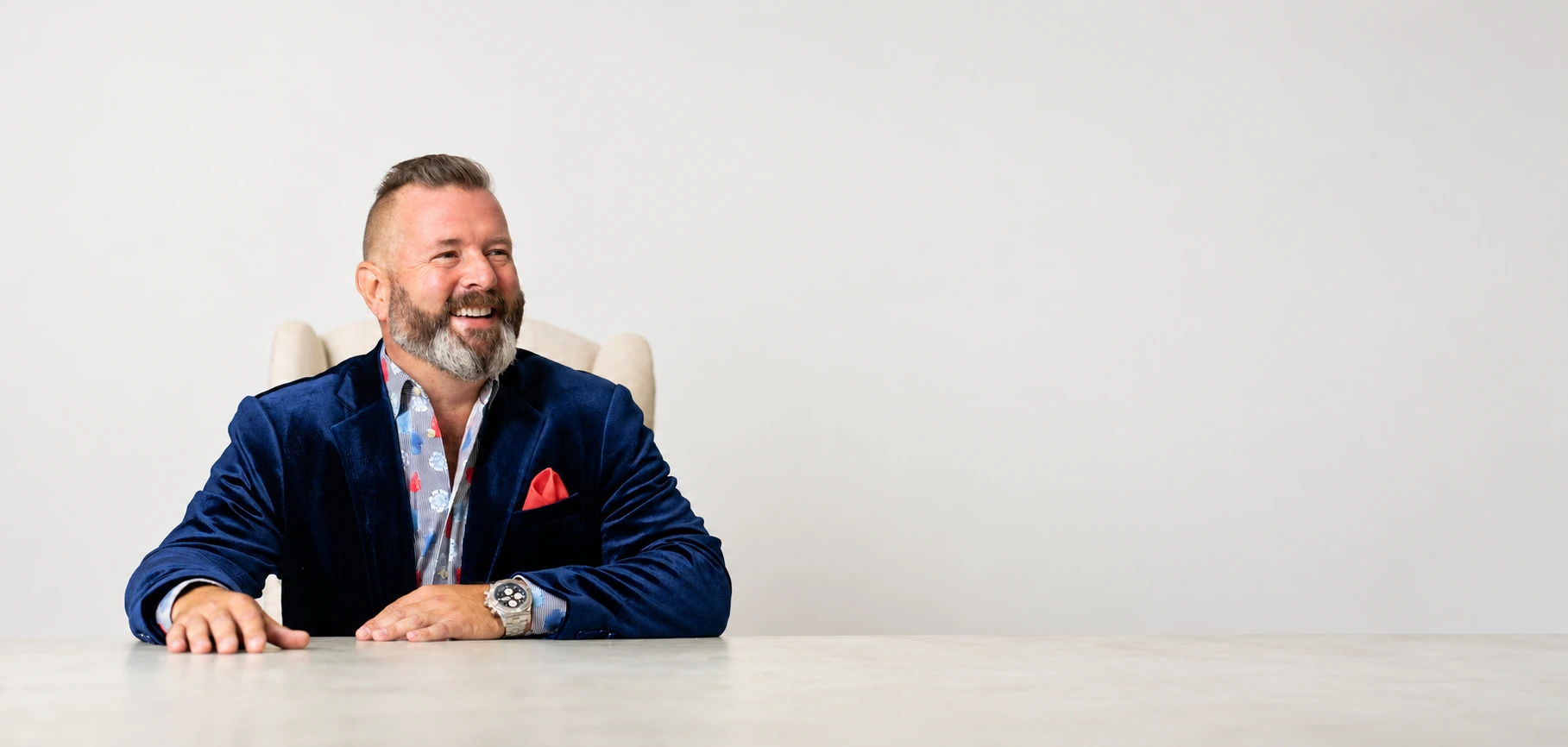 Rick Van House seated at a table, ready for a conversation